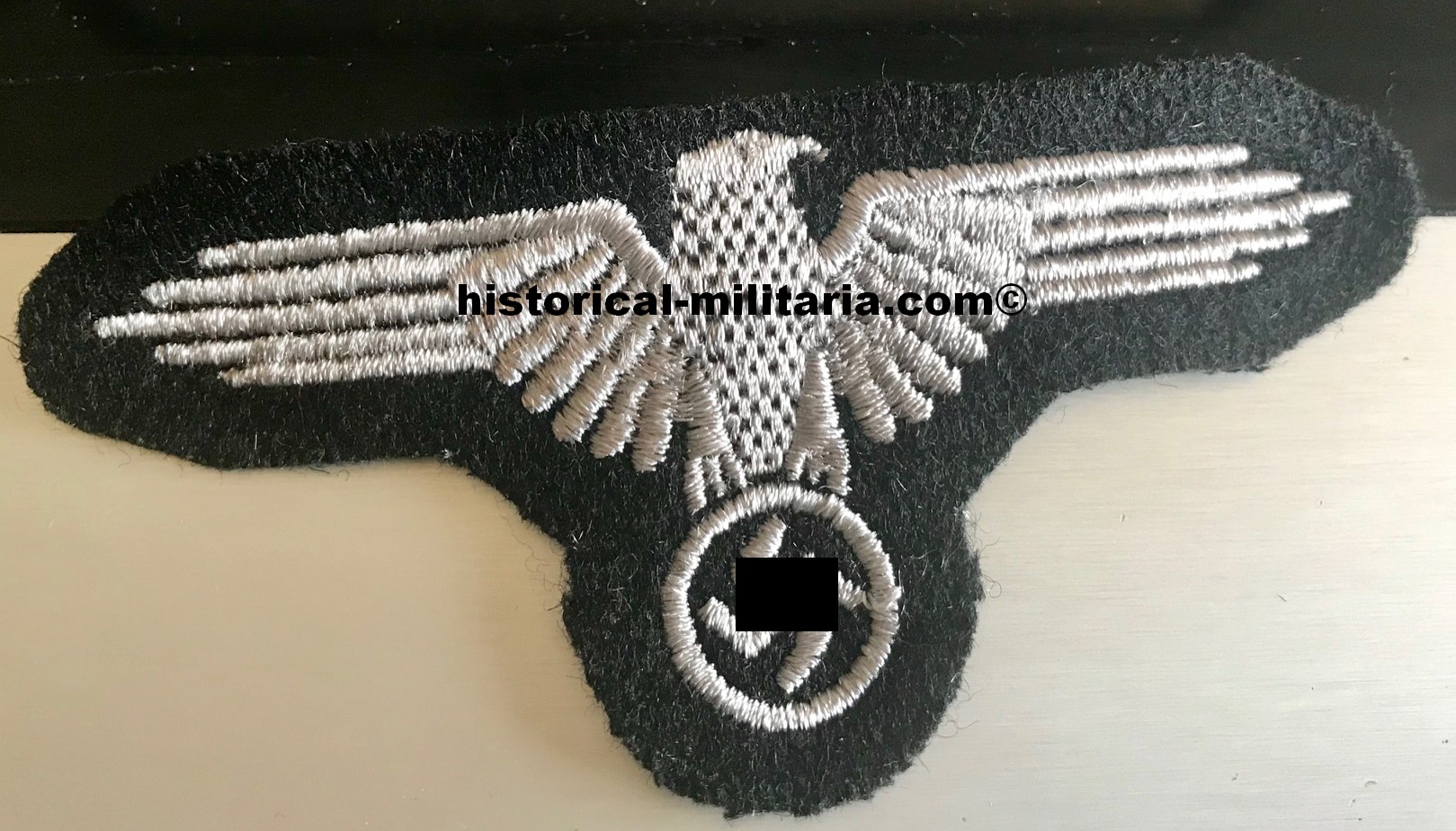 Waffen-SS EM/ NCO sleeve eagle machine-embroidered in greyish silver cotton threads - Maschinengestickter SS Ärmeladler Mannschaften - Aquila SS da braccio per le truppe delle Waffen-SS Waffen-SS EM/ NCO sleeve eagle machine-embroidered in greyish silver cotton threads - Maschinengestickter SS Ärmeladler Mannschaften - Aquila SS da braccio per le truppe delle Waffen-SS
