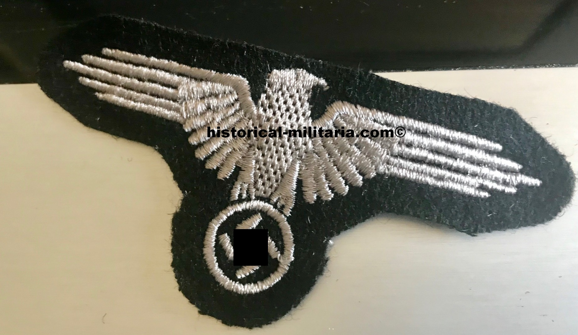 Waffen-SS EM/ NCO sleeve eagle machine-embroidered in greyish silver cotton threads - Maschinengestickter SS Ärmeladler Mannschaften - Aquila SS da braccio per le truppe delle Waffen-SS Waffen-SS EM/ NCO sleeve eagle machine-embroidered in greyish silver cotton threads - Maschinengestickter SS Ärmeladler Mannschaften - Aquila SS da braccio per le truppe delle Waffen-SS