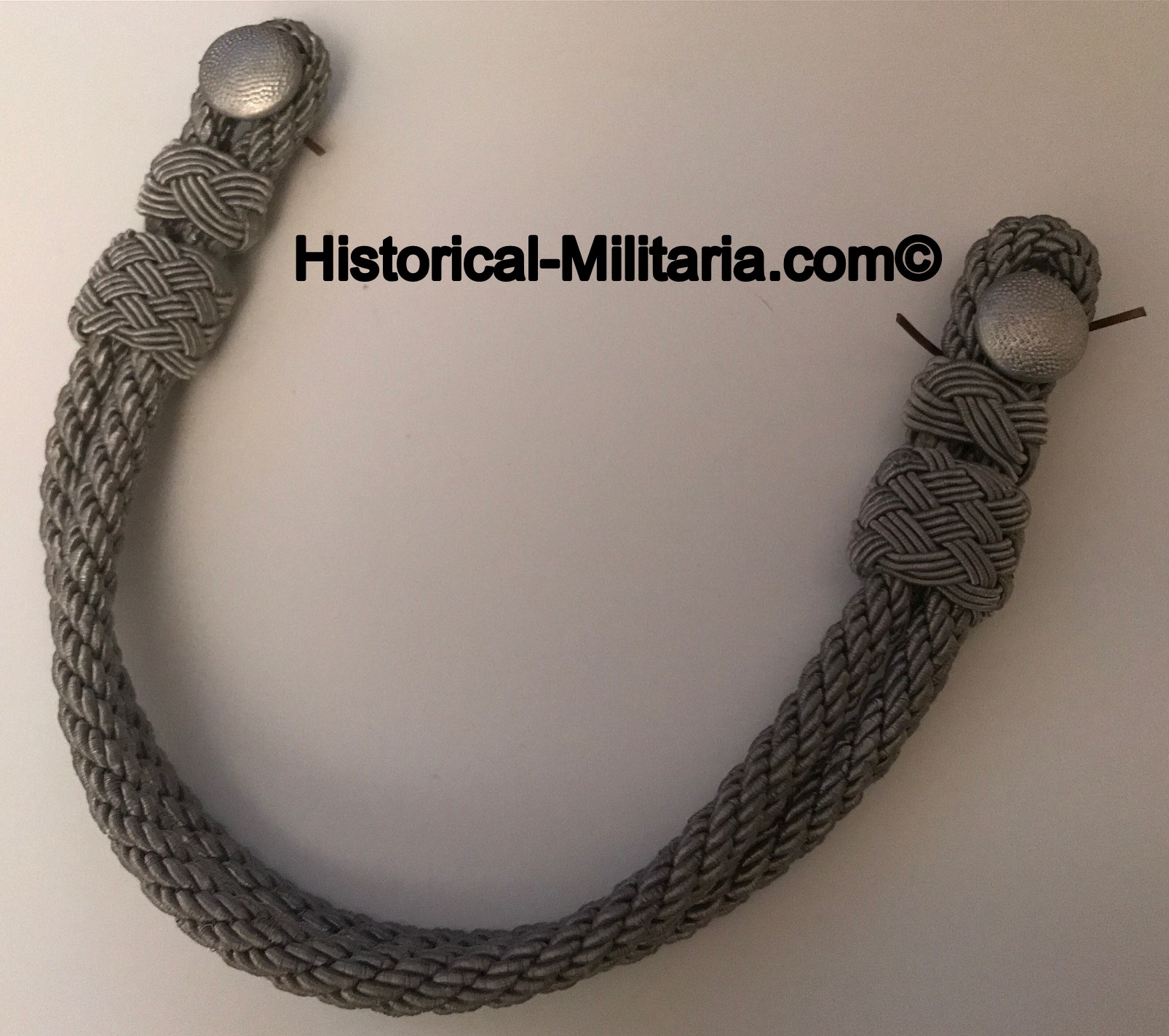 German Officer visor cap cord with two buttons 8mm - Schirmmütze Mützenkordel Offizier 8mm mit gekörnten Knöpfen - Doppia Cordellina per il berretto a visiera per l'Ufficiale con 2 bottoni German Officer visor cap cord with two buttons 8mm - Schirmmütze Mützenkordel Offizier 8mm mit gekörnten Knöpfen - Doppia Cordellina per il berretto a visiera per l'Ufficiale con 2 bottoni