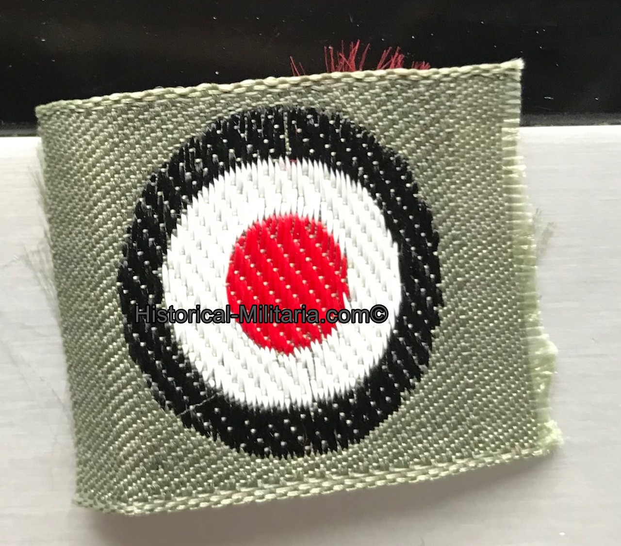 EM/ NCO German army woven cockade on fieldgrey - Heer Mützenkokarde auf feldgrau - Coccarda nazionale tedesca da bustina su panno feldgrau della Heer EM/ NCO German army woven cockade on fieldgrey - Heer Mützenkokarde auf feldgrau - Coccarda nazionale tedesca da bustina su panno feldgrau della Heer