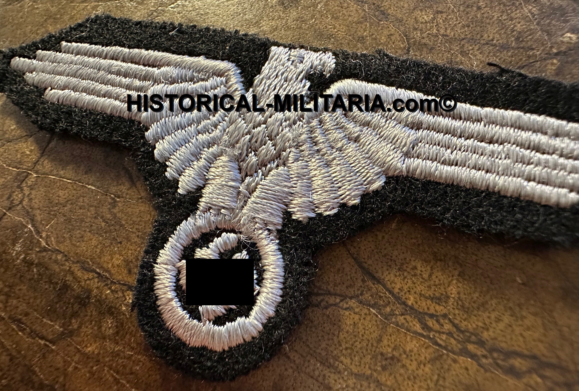Waffen-SS EM/ NCO sleeve eagle machine-embroidered in greyish silver threads - Maschinengestickter SS Ärmeladler Mannschaften grausilber- Aquila da braccio per le truppe delle Waffen-SS Waffen-SS EM/ NCO sleeve eagle machine-embroidered in greyish silver threads - Maschinengestickter SS Ärmeladler Mannschaften grausilber- Aquila da braccio per le truppe delle Waffen-SS