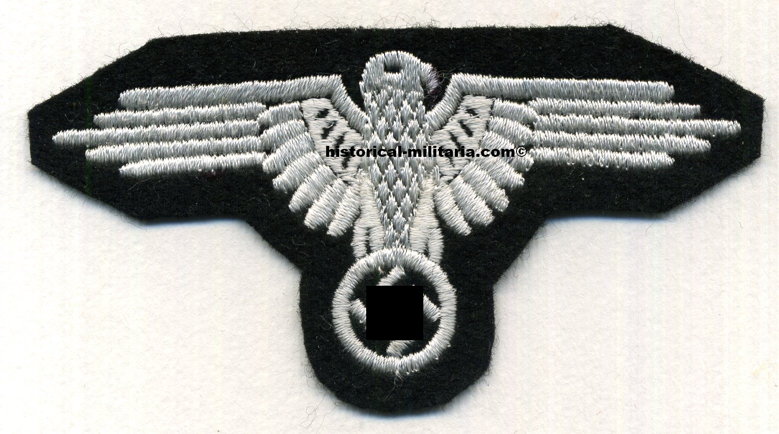 Waffen-SS EM/ NCO sleeve eagle machine-embroidered in white threads - Maschinengestickter SS Ärmeladler - Aquila SS da braccio per le truppe delle Waffen-SS Waffen-SS EM/ NCO sleeve eagle machine-embroidered in white threads - Maschinengestickter SS Ärmeladler - Aquila SS da braccio per le truppe delle Waffen-SS