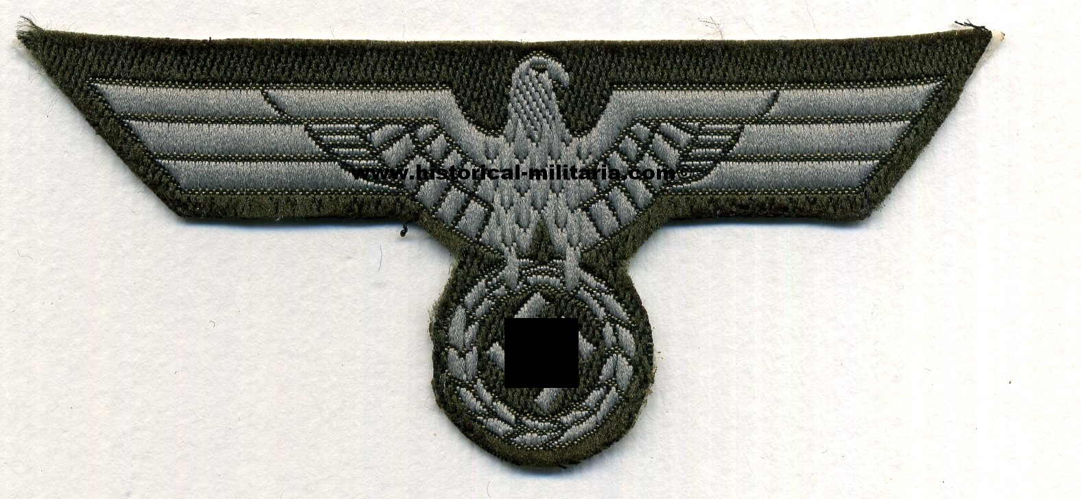 German Wehrmacht Brustadler bevo woven breast eagle on green - Heer Brustadler Mannschaften gewebt auf grün - Aquila da petto per le truppe heer - 1 piece left on stock German Wehrmacht Brustadler bevo woven breast eagle on green - Heer Brustadler Mannschaften gewebt auf grün - Aquila da petto per le truppe heer - 1 piece left on stock